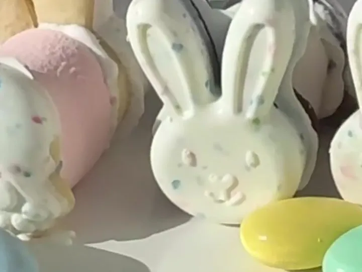 White chocolate coated bunny cookies sandwiched around marshmallows